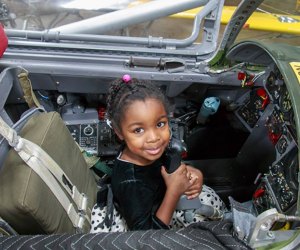Image of child in airplane cockpit - Things To Do in Hartford