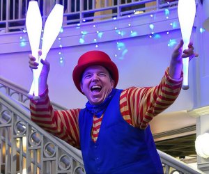 Greg May performs at the Noon Time New Year celebration. Event photo courtesy of the Port Discovery Children's Museum