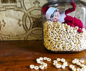 Elf on the shelf ideas for all of December, including elf trapped in a cereal jar!