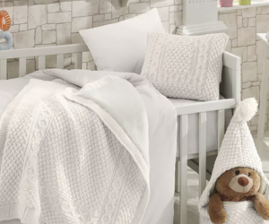 Plush-baby-bedding: Deinfluencing Your Baby Registry: Baby Products You Totally Don’t Need