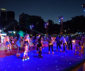 The DiscOasis in Central Park skaters circle the rink