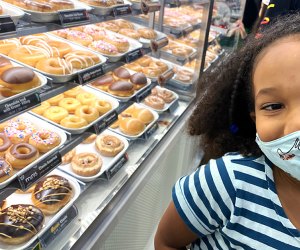 a girl at krispy kreme donuts