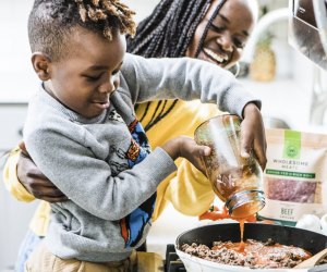 One top tip is getting kids involved from the planning stage, and they'll want to help cook! Photo by Brooke Lark, via Pexels