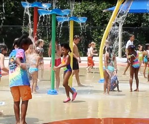 Delight in the soaking poles at East Roswell Sprayground.