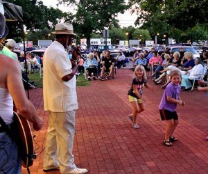 Enjoy magical musical moments with your kids this summer at a free concert in downtown Kings Park. Photo courtesy of community of Kings Park