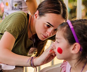Facepainting is a hit at the Fall Festival at Newton Community Farm. Photo by Bruce Wilson