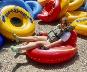 Photo of child in a tube - Farmington River Tubing