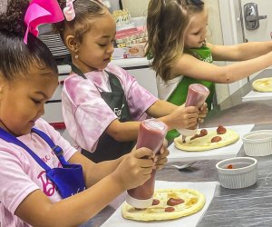 Kids of all ages get involved with cooking classes. Photo courtesy of Foodology Cooking School