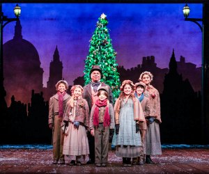 Ford's Theatre is a great place to see A Christmas Carol. Photo of Craig Wallace and the young cast of A Christmas Carol at Ford's Theatre, photo by Titus Ogilvie-Laing