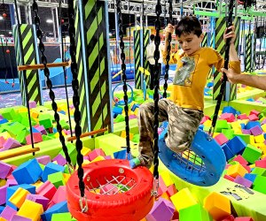 Fun Max Adventure Park's features include slides, a ball pit, and an obstacle course.
