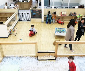 At Good Day Play Cafe, parents and caregivers can sit back in the cafe at still keep an eye on their kiddos in the play space. Photo by Louise Trapasso 