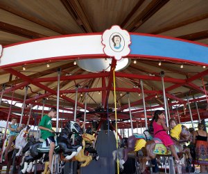 Take a ride (or two!) on the antique carousel at Mitchell Park. Photo courtesy of Greenport Village