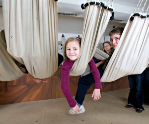 Photo of child in hammock on USS Constitution Museum.