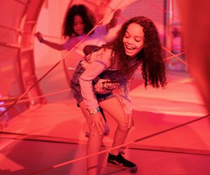 little girl going through the twizzler maze at the Hershey Super Sweet Adventure