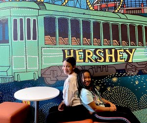 Pose for a post-card worthy photo in front of the Hershey-themed mural at Tru by Hilton Hershey Chocolate Avenue during your stay. 