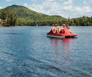 Enjoy watersports like pedal boating during your weekend getaway at High Peaks Resort in Lake Placid