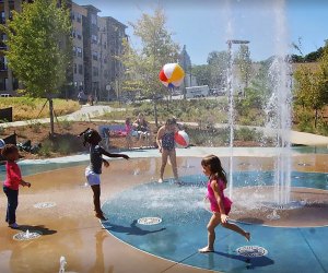 In the warmer months cool down in the splash pad at Historic Fourth Ward Park and Playground. 