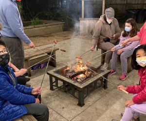 Roasting hot dogs for dinner at Nature Discovery Center's Campfire Night. Photo by author 