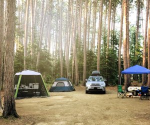 You'll be surrounded by woods at this Maine campground.