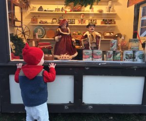 The viewing windows at Dickens Village in Maplewood are just the right height for little visitors. Photo by Rose Gordon Sala