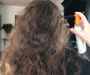 Leave-in conditioners make managing those epic knots so much easier. Photo by Meghan Rose
