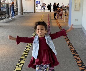 Image of a child exploring Boston's Museum of Science.