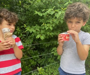 Two boys eating ice cream