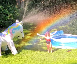 Set up a kiddie pool and mega sprinkle for backyard summer fun. Photo by Ally Noel