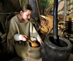 Image of child learning traditional Native American culture in CT.