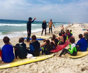 Kids taking surf lessions on the East End of Long Island