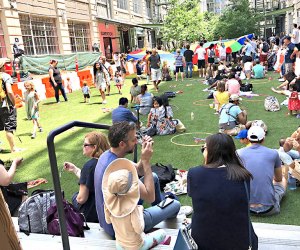 People eating outside of Industry City's food hall in Brooklyn, New York