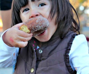 Enjoy an apple cider doughnut during your apple picking trip to Johnson's COrner Farm