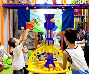Catch the foam balls at Jumpin' Jax indoor play space in Paramus