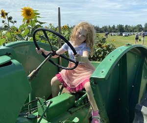 Johnson's Locust Hall Farm: Little girl on a tractor