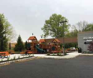 Playground and outdoor dining area at Char Burger