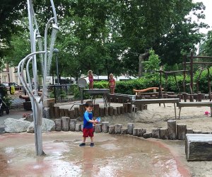 Photo of child at one of Boston's best splash pads and splash parks.