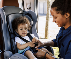 Kidmoto car service addresses the all-too-common challenge of getting families with young kids to the airport safely.