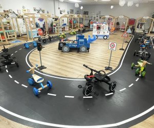 Kids can hop on tricycles and ride around the indoor track at L.I. Salty Kids Cove. 