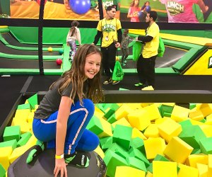Girl jumping in a foam pit at Launch Trampoline Park in NYC
