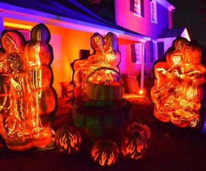 The Great Jack-o'-Lantern Blaze features hand-carved jack-o’-lanterns in elaborate displays at Old Bethpage Village Restoration. Photo by Jaime Sumersille