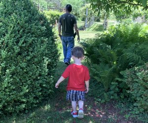 Hike through the grassy terrain at Sweetbriar Nature Center during a toddler-friendly hike on Long Island.