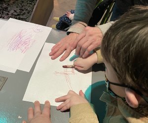 crayon rubbing Dinosaurs Stomp and Roar at Long Island Children's Museum