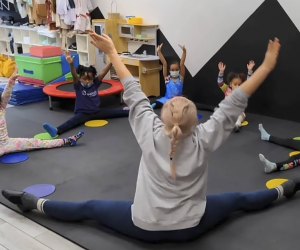 Little Lola and Tots kids doing yoga stretching Brooklyn Drop-In Play Spaces and Kiddie Gyms