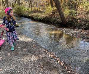 Girl with a scooter at Loantake Brook