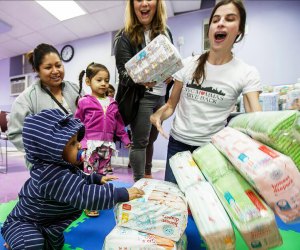 NYC Mamas Give Back helps distribute diapers and other necessities to families in need.