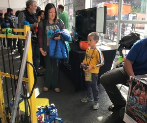 Little techies greet robots and their makers. Photo courtesy of MassRobotics