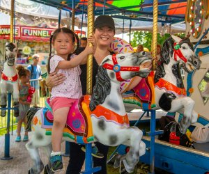 Enjoy rides, games, a petting zoo, and more at McLean Day. Photo courtesy of the event