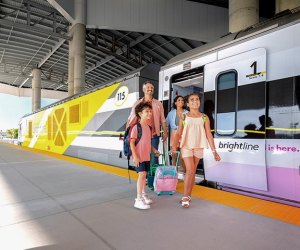 Family baording the Brightline trainstation in Orlando