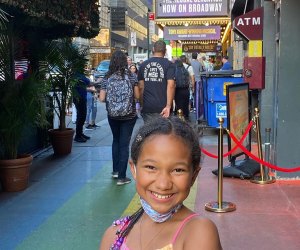Things To Do in Midtown West with Kids: Girl in front of SIX on Broadway