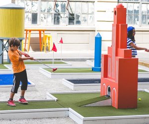 kids playing Mini golf